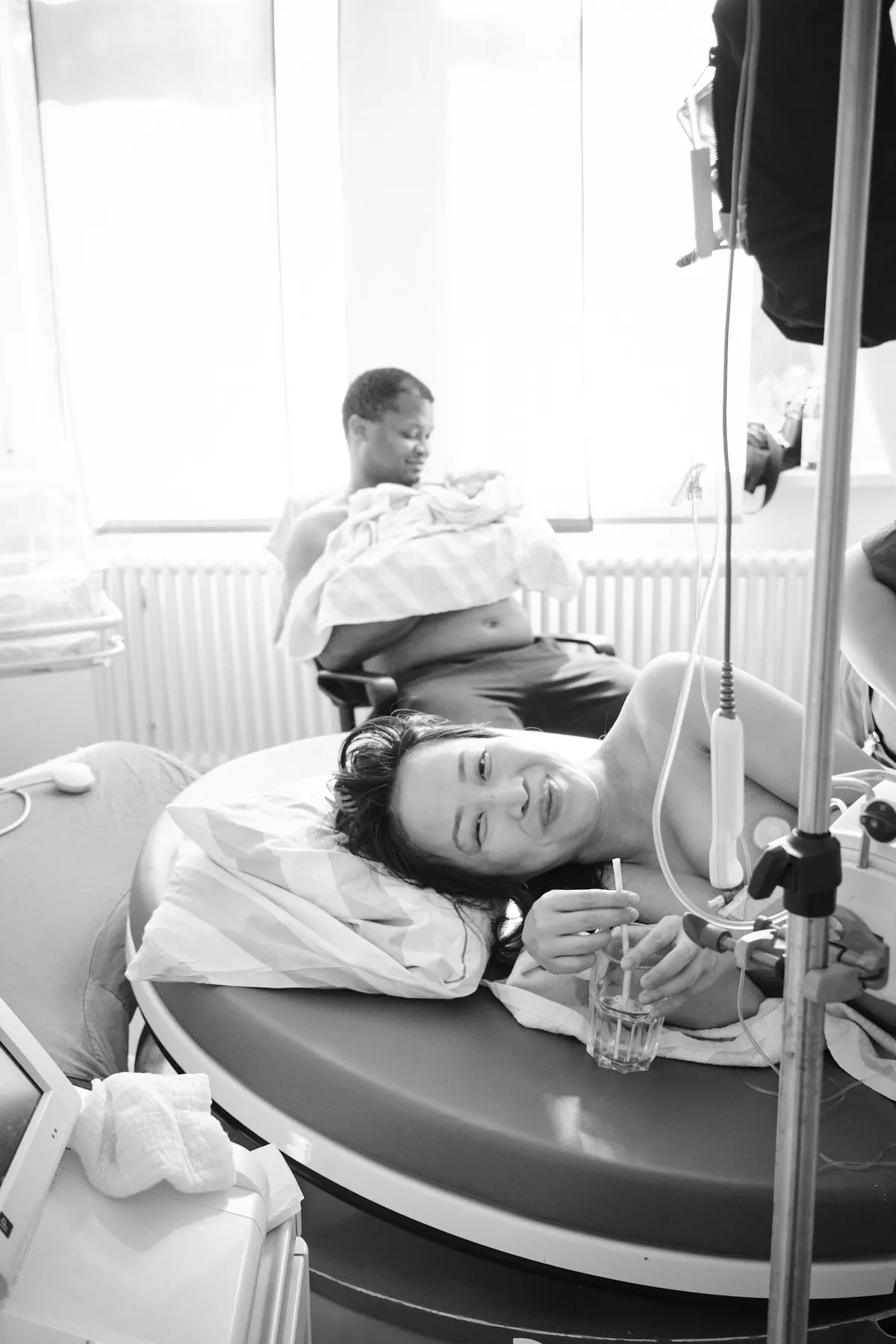 Father cutting the umbilical cord after the birth