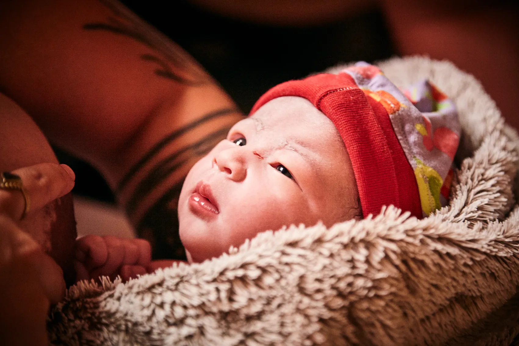 Partner holding the mother's hand during active labour