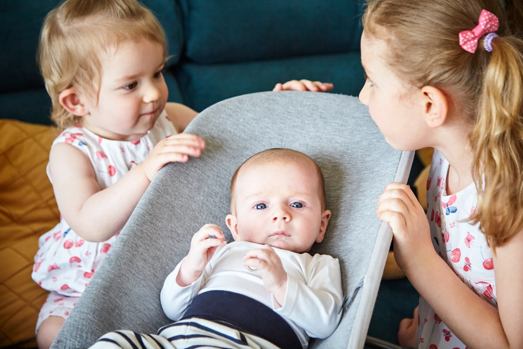 Parents and children laughing during a family photo session